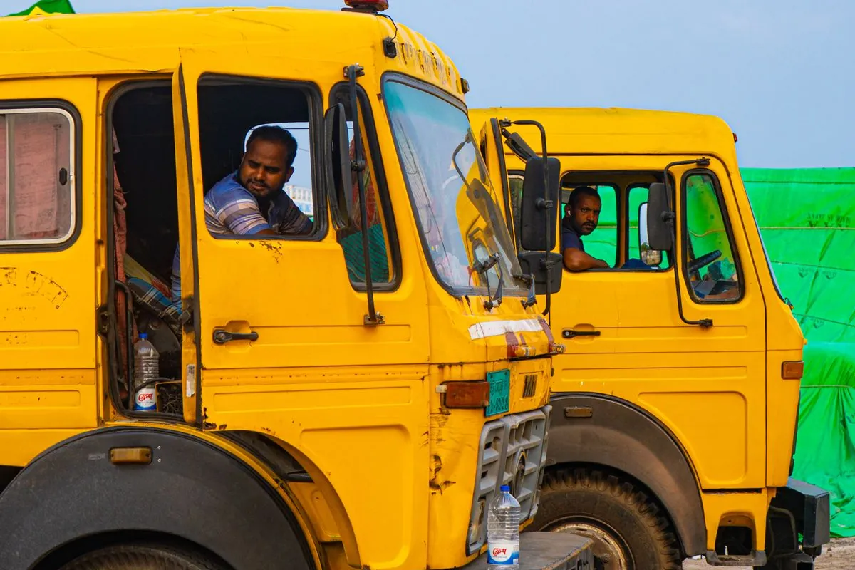 JK Express drivers in their trucks