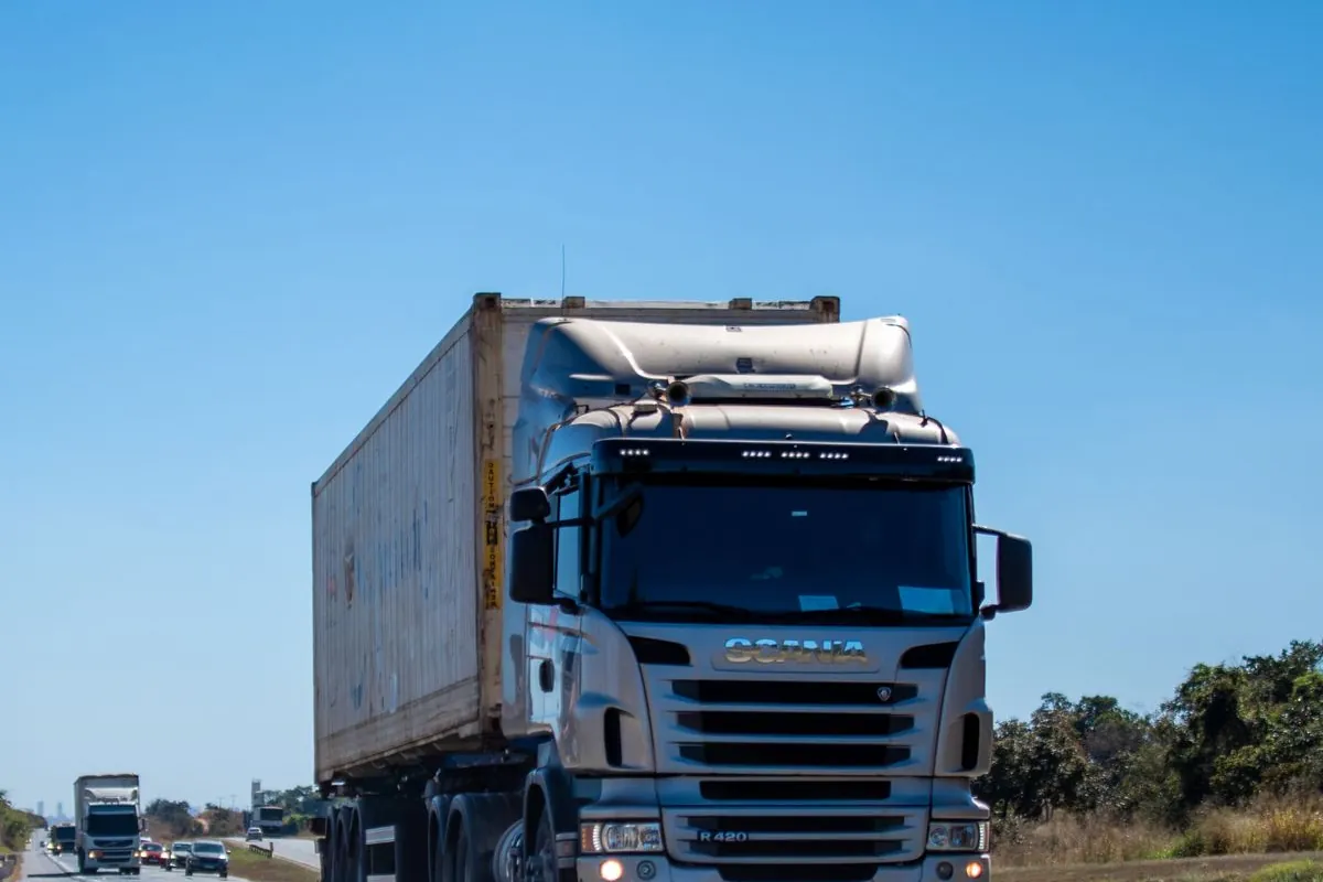White container truck on a highway