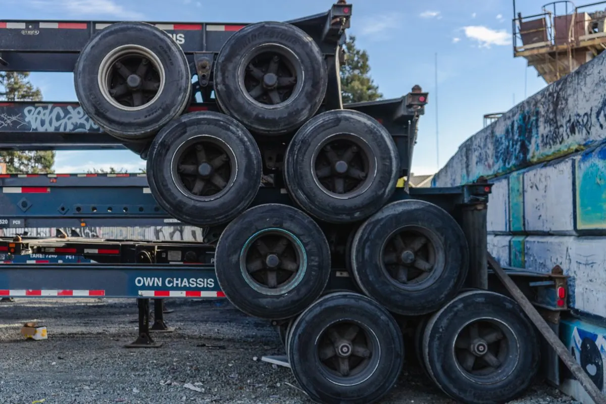 Stacked truck tyres in the workshop